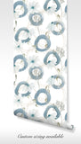 Stylish botanical wallpaper featuring blue abstract loops and white flowers in watercolor