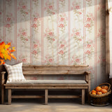 Elegant floral stripe wallpaper with soft pink flowers, ideal for living rooms and bedrooms