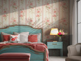 Classic wallpaper design featuring pink floral patterns and soft stripes