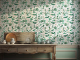 Eucalyptus leaves wallpaper with green foliage and golden accents