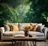 Lush tropical jungle wallpaper with green leaves and orange flowers in sunlight