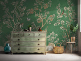 Botanical wallpaper with green background featuring floral and bird designs