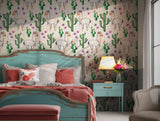 Desert-inspired wallpaper with llamas, cactus accents, and cheerful blooms