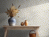 Elegant gold polka dot pattern ideal for contemporary wall decor