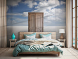 Dreamlike artistic wallpaper featuring a wooden door in a desert