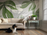 Premium tropical wallpaper with neutral tones and lush green leaf patterns