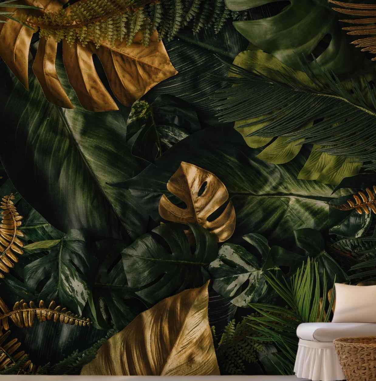 Exotic golden and green jungle leaves forming a rich tropical mural for temporary wallpaper applications with removable material.