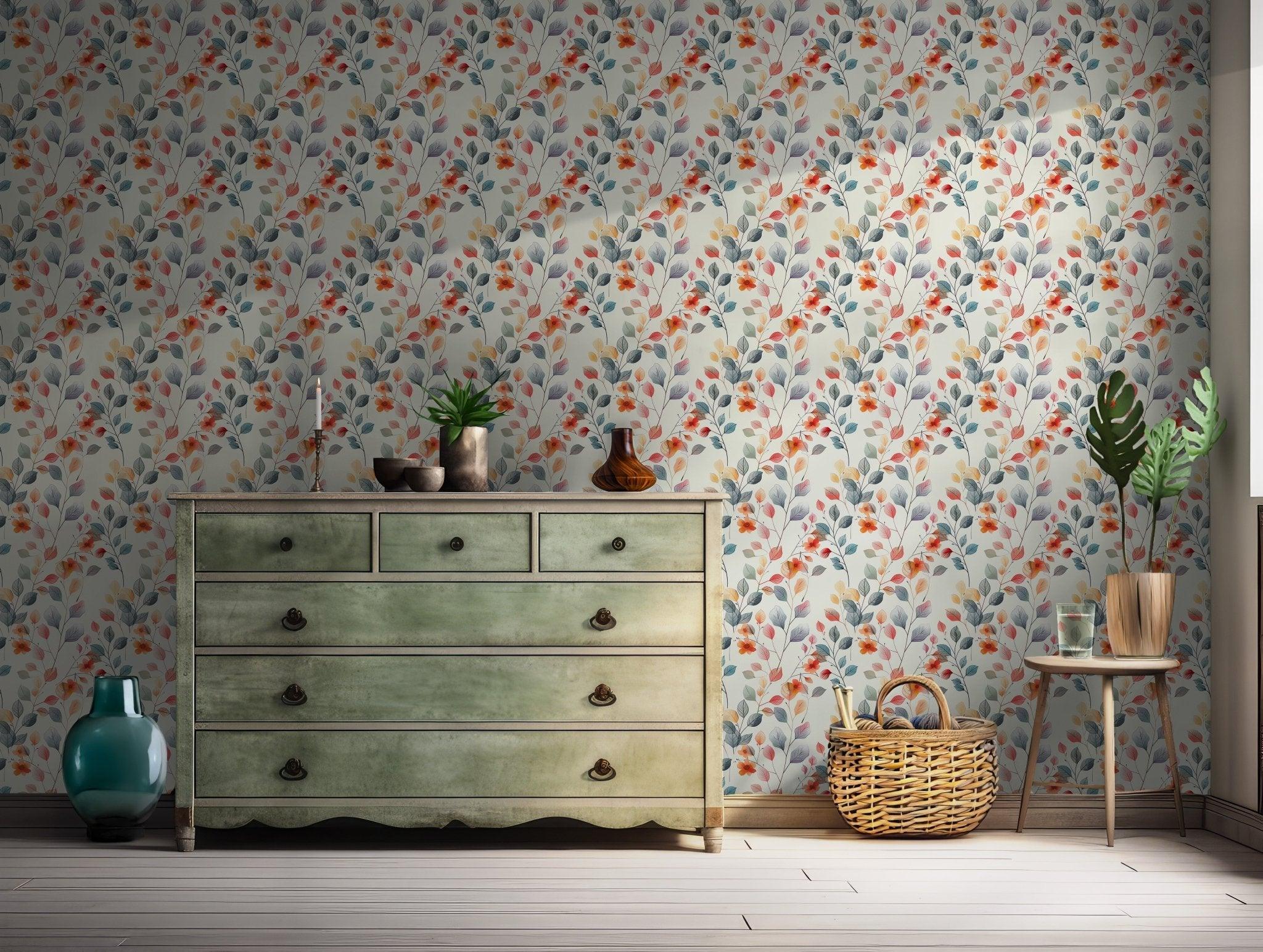 Soft watercolor leaf print in coral and blue on peel and stick removable wallpaper, ideal for renters or temporary design projects.