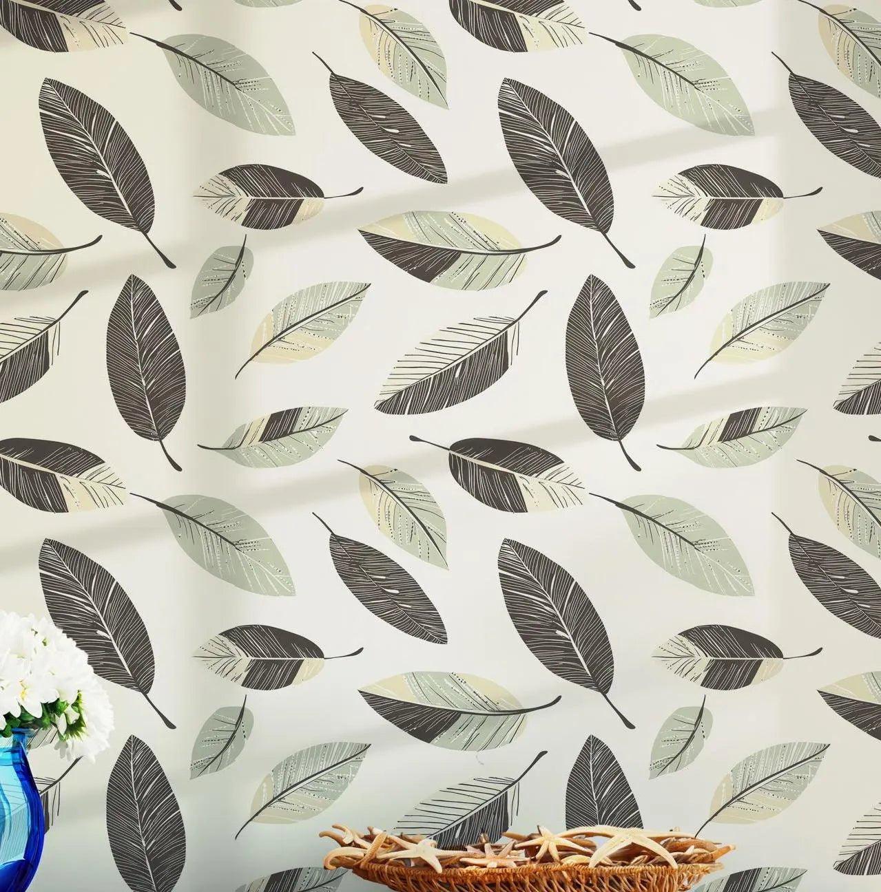 Cream-toned leaf art with sage and black accents, designed as removable wallpaper for safe installation in rentals or short stays.